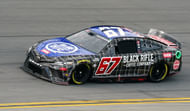 NASCAR Cup Series driver Travis Pastrana (67) races during the Daytona 500 at Daytona International Speedway. - Source: Imagn